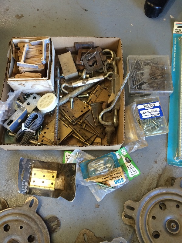 Assorted lot of hardware, door springs, hinges, chair swivels, pulleys, tools, & Misc