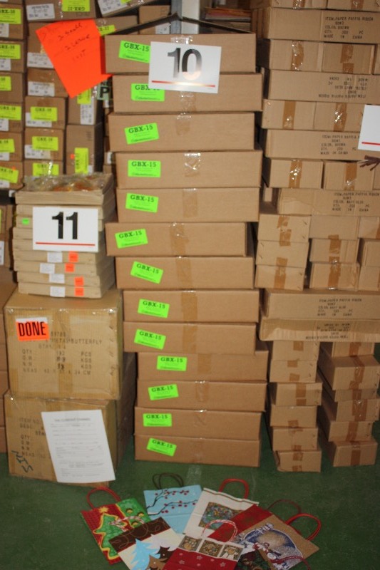 13 boxes of 50 Medium Holiday handled Gift Bags. Assorted Holiday design.
