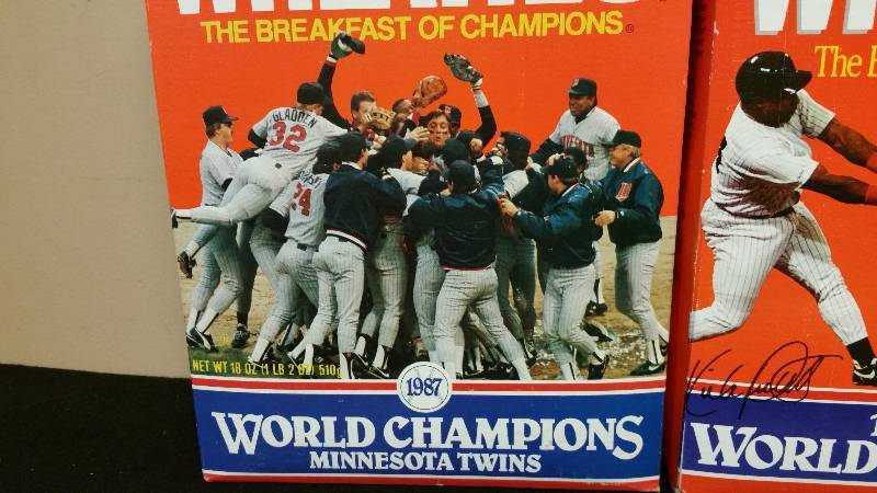 lot 110 image: Minnesota Twins Bat & Collectable Wheaties Boxes
