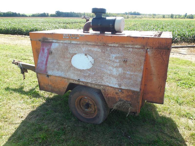 lot 11 image: TOWABLE DIESEL AIR COMPRESSOR
