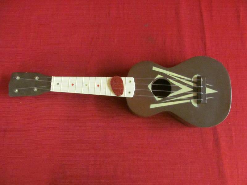 lot 138 image: Montgomery Wards childs Toy Guitar