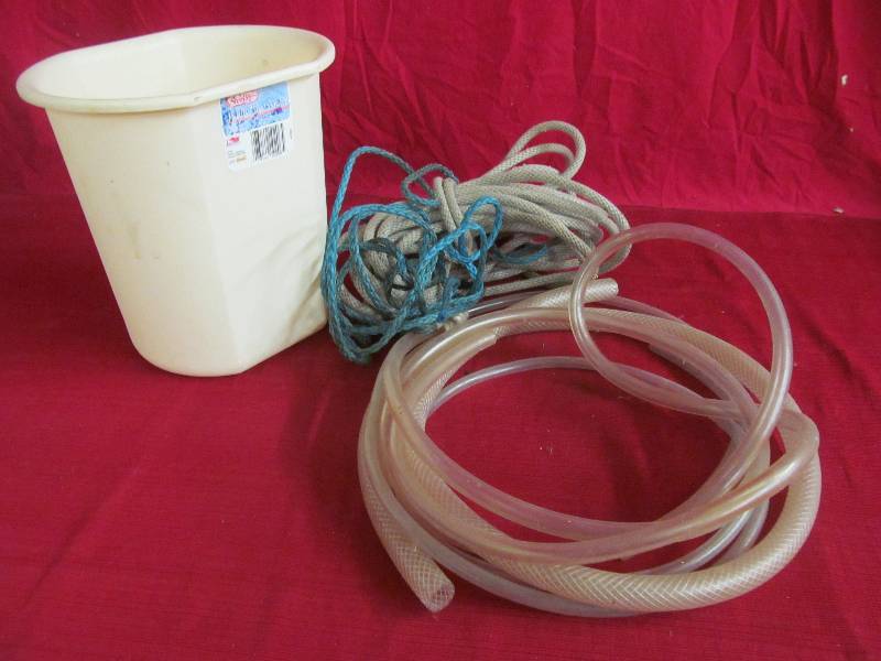 lot 146 image: rope, hoses, waste basket
