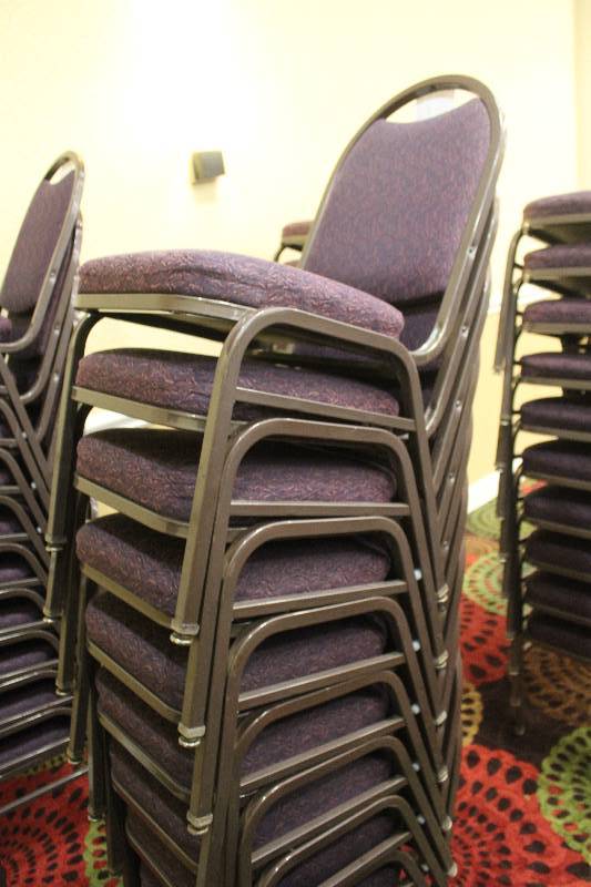 lot 396 image: Lot of (10) Stacking Mauve Fabric Conference Chairs