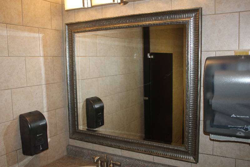 lot 548 image: Mens Bathroom Framed Wall Mirror, Soap Dispenser, Towel Dispenser, Garbage Can