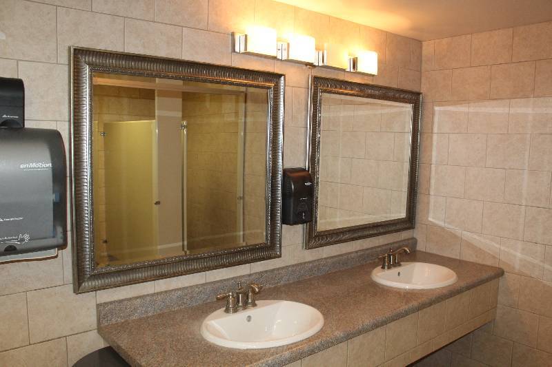 lot 547 image: Lot of (2) Womens Bathroom Framed Wall Mirrors, Soap Dispenser, Towel Dispenser, Garbage Can