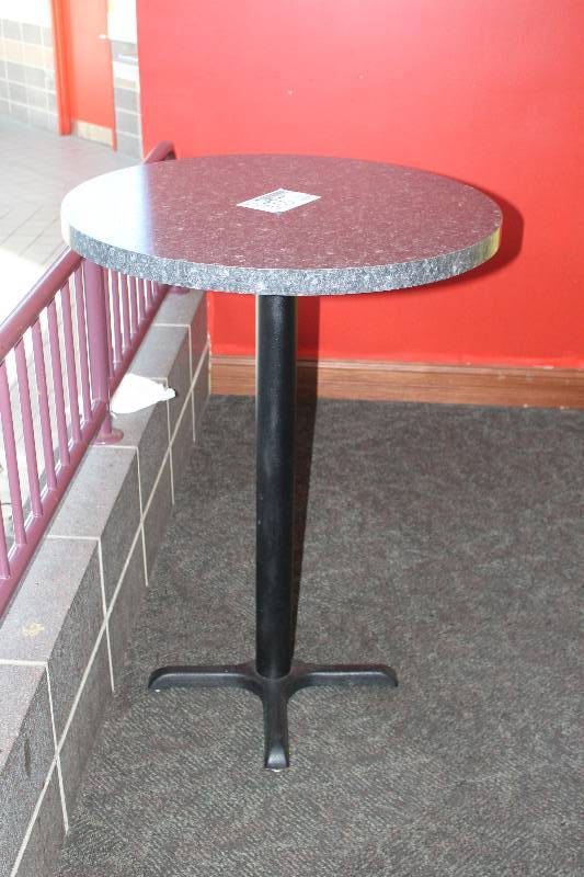 lot 555 image: 30in. Round Table