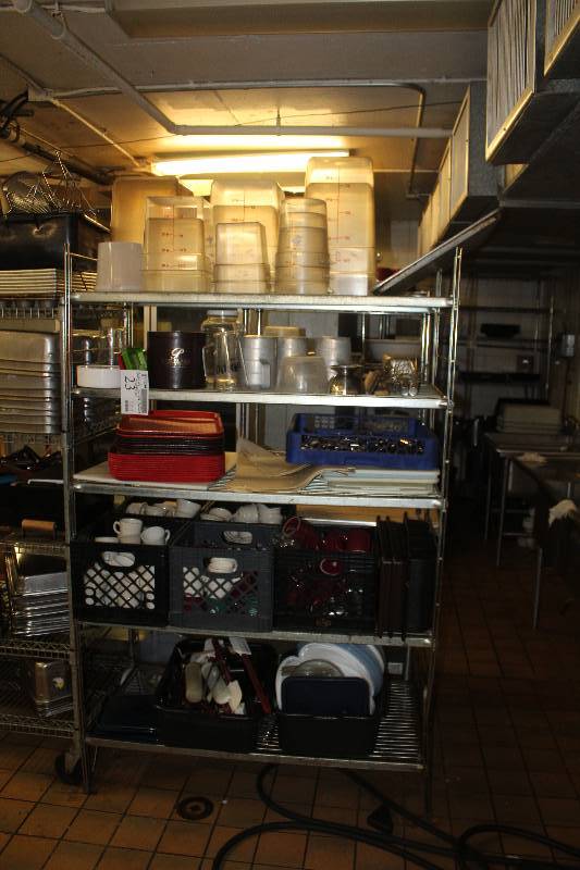 lot 23 image: Shelving Unit & Contents Including Cups, Trays, Flatware, Plastic Bins