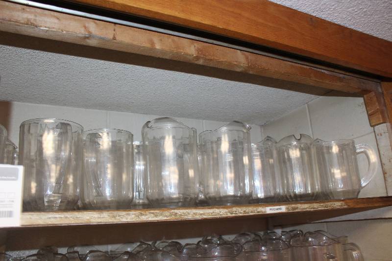 lot 595 image: Shelf Lot of Dishware Including (Approximately 40) Plastic Pitchers