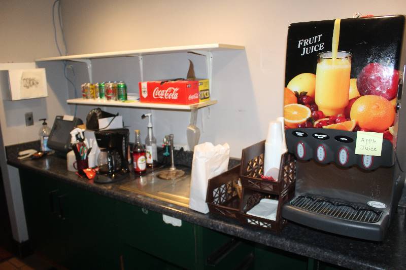 lot 652 image: Contents of Shelves Including Coffee Maker, Beverages, And More