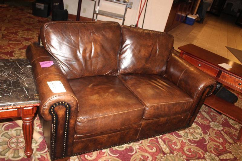 lot 896 image: Leather Love Seat