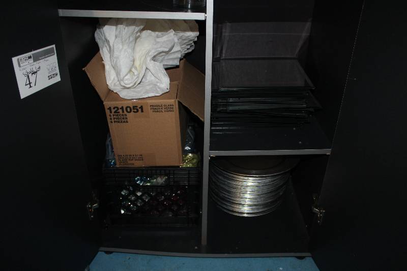 lot 47 image: Shelf Lot Including Ribbon, Plastic Plates, Mirrors, Glassware