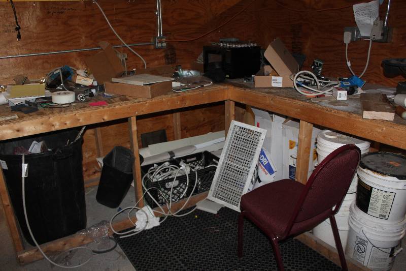 lot 957 image: Contents Of Desk Including Power Cables, Air Duct Grates, And More
