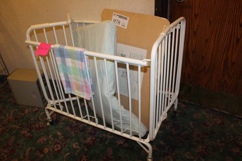 lot 978 image: The Holiday Crib Folding Metal Portable Crib