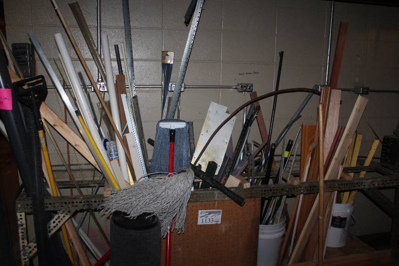 lot 1133 image: Shelf Lot of Mops, Pipe, Steel, Wood, Brackets, And More