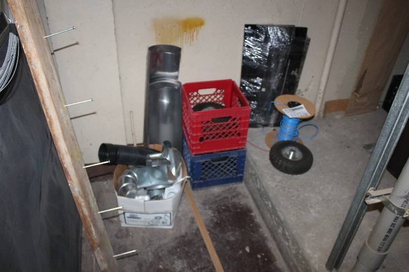 lot 1117 image: Remainder of Room Lot Includes Plastic Crates, Ducting, WheelTire, Partial Wire Coil, And More
