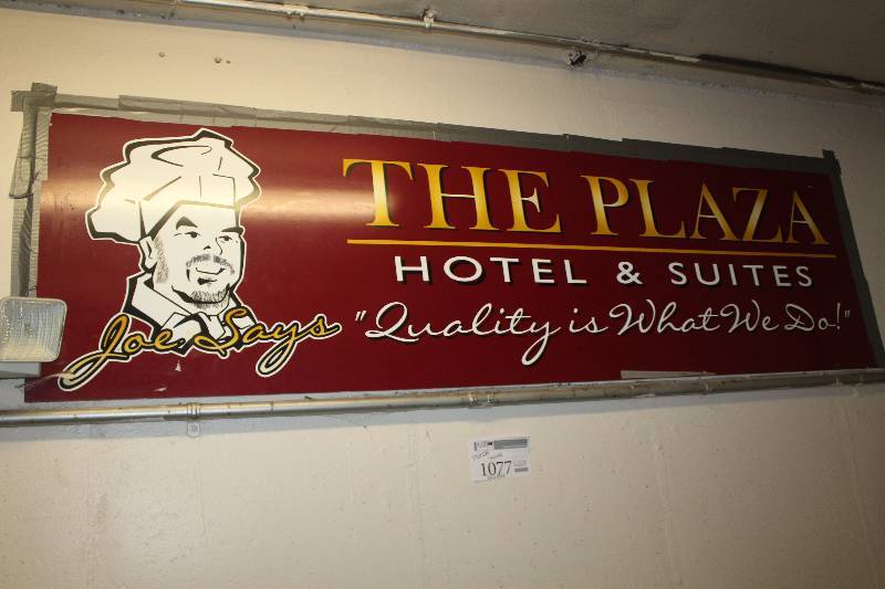 lot 1077 image: The Plaza Hotel & Suites Sign