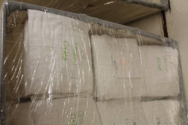 lot 1029 image: Lot of (2) Stacks of Queen Fitted Sheets