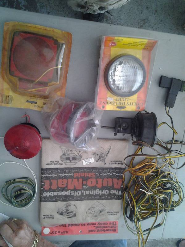 lot 80 image: 1-Submersible Trailer Light, 1-Utility Light, 2-Other Lights, Wires, Plug Adapters, Related