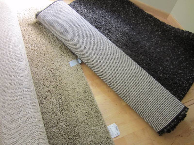 lot 68 image: Pillows and Rugs
