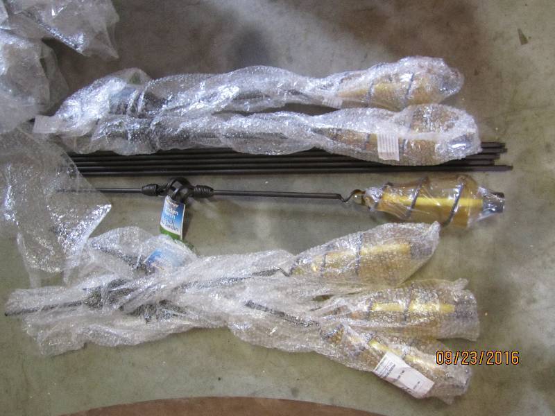 Lot of 6 garden torches, on metal s...
