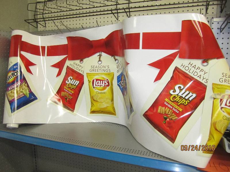 Very long Frito Lay chip display ba...