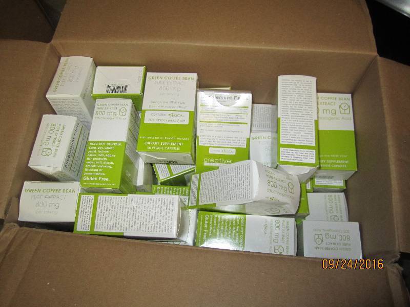 Large case of green coffee bean pur...