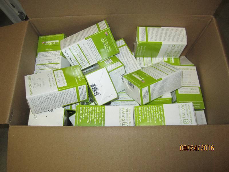 Large case of green coffee bean pur...