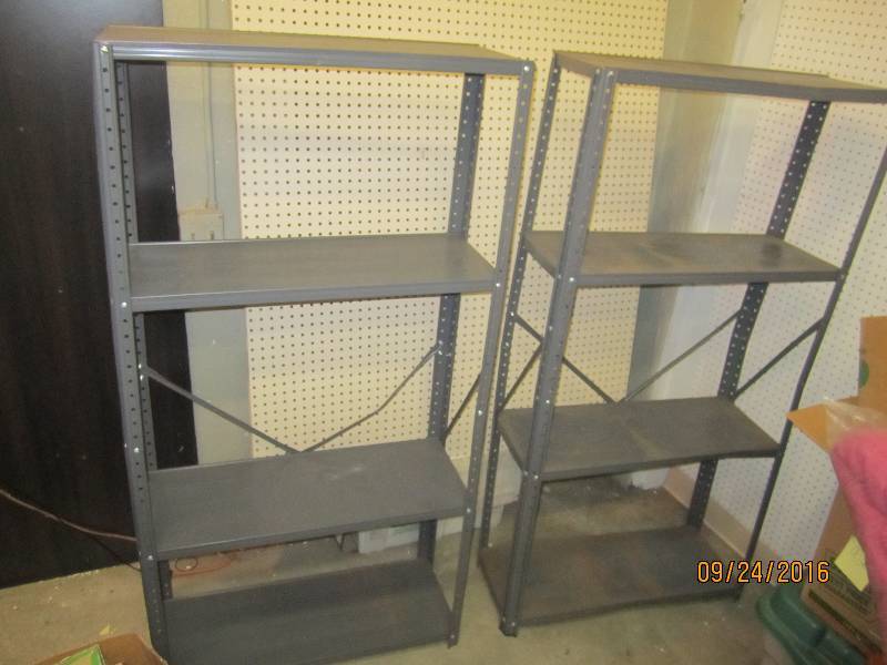 2 5 foot tall metal shelves...