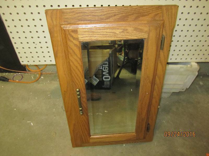 16 x 26 wood mirrored cabinet...