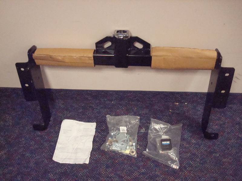 lot 8 image: Reese Trailer Mount, Unused, For A GM Van, Part Number 51023