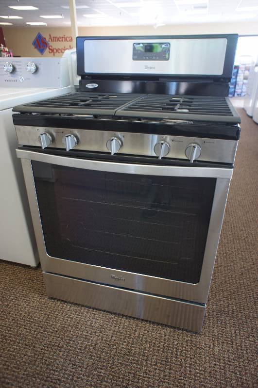 lot 15 image: NEW - Whirlpool 5.8 Cu. Ft. Freestanding Gas Range with Center Burner WFG540H0ES - Black-on-Stainless
