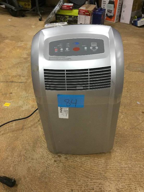 lot 84 image: Whynter 12,000 BTU Portable Air Conditioner with Dehumidifer and Remote in working conditions