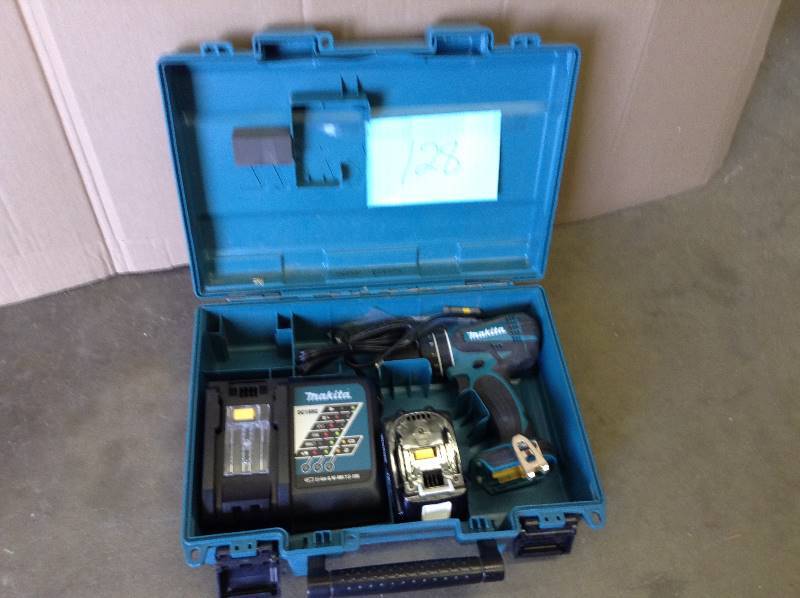 lot 128 image: Makita Drill Battery and Charger in like new condition