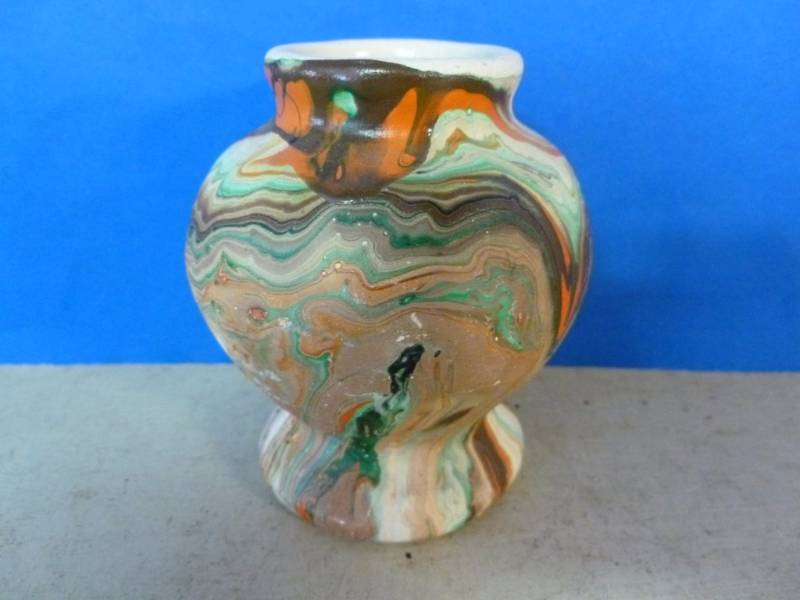 lot 102 image: Nemadji Pottery
