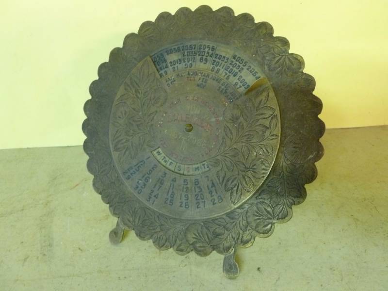 lot 173 image: Vintage Brass Dial Calendar