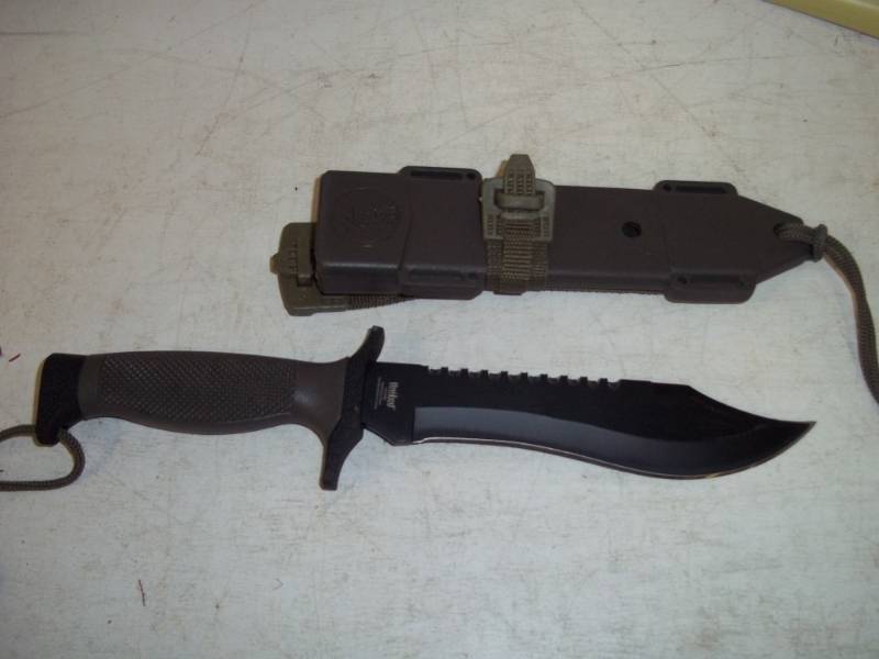 Knife with poly sheath