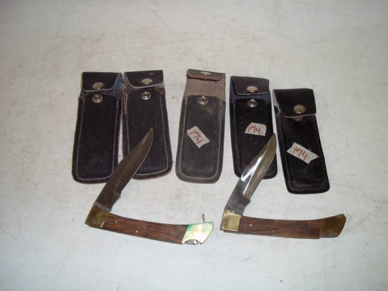 4 knives with sheaths