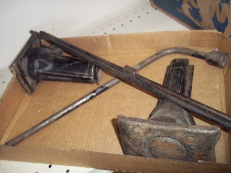 Pair of car jacks and tire wrench