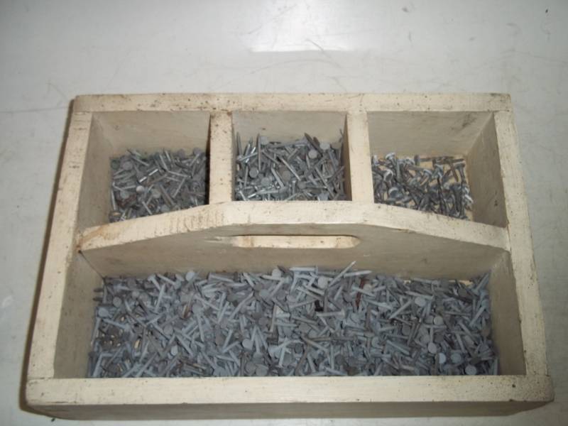 Wood tool box with roofing nails