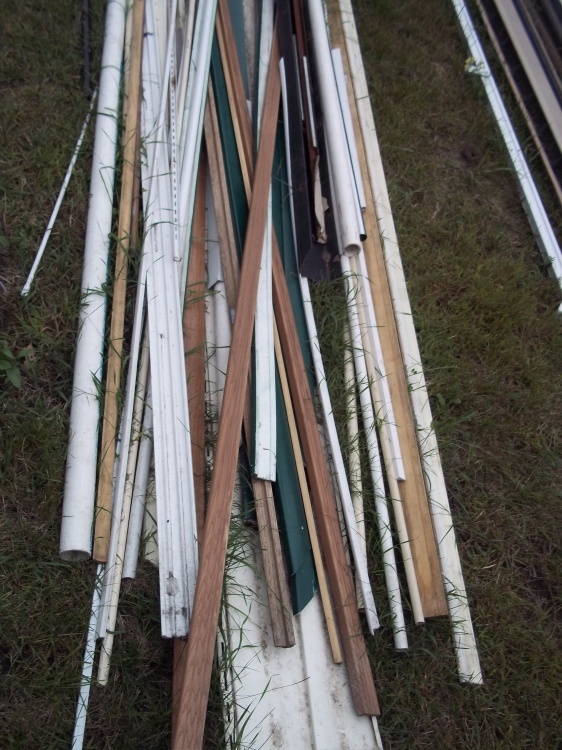 PVC pipe, trim and siding pieces