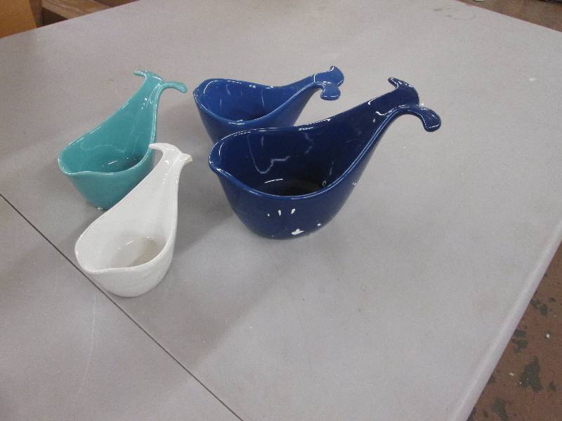 lot 12 image: Whale Tale Measuring Cups 14, 13 ...