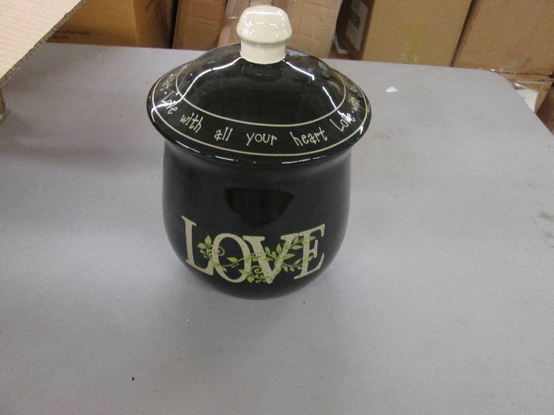 lot 14 image: Love Canister chip in cover...