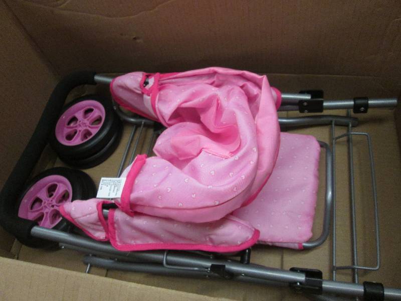 lot 220 image: Pink Doll Stroller open box Retail ...