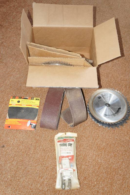 lot 26 image: Lot of Sanding Belts, Clamps, Rivet Plier and Saw Blades