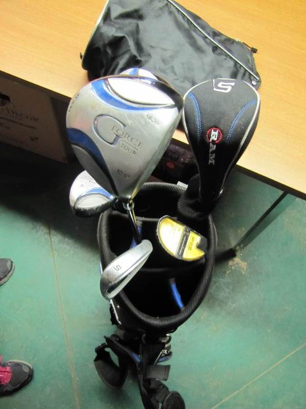 Golf Bag with some clubs