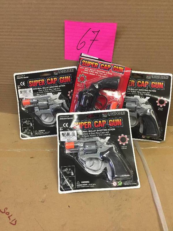 Lot of 4 Cap Guns