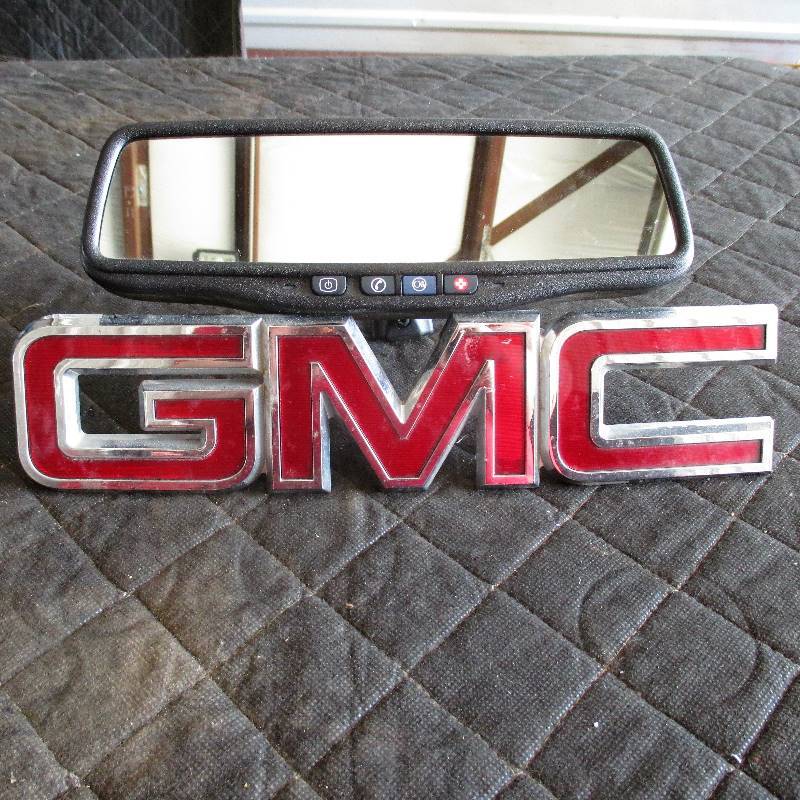 GMC BADGE AND REARVIEW MIRROW WITH ON STAR