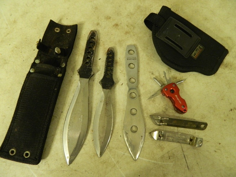 lot 59 image: Throwing Knives, Gun Holster, Hamms Beer Openers, and More
