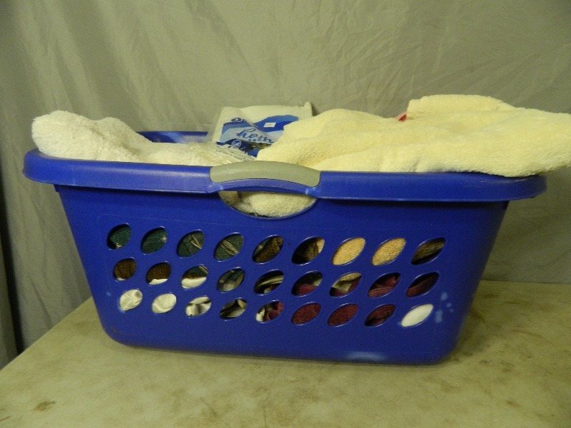 lot 80 image: Basket Full of Linens