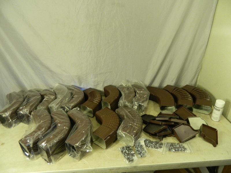 lot 89 image: Lot of New Brown Gutter Parts